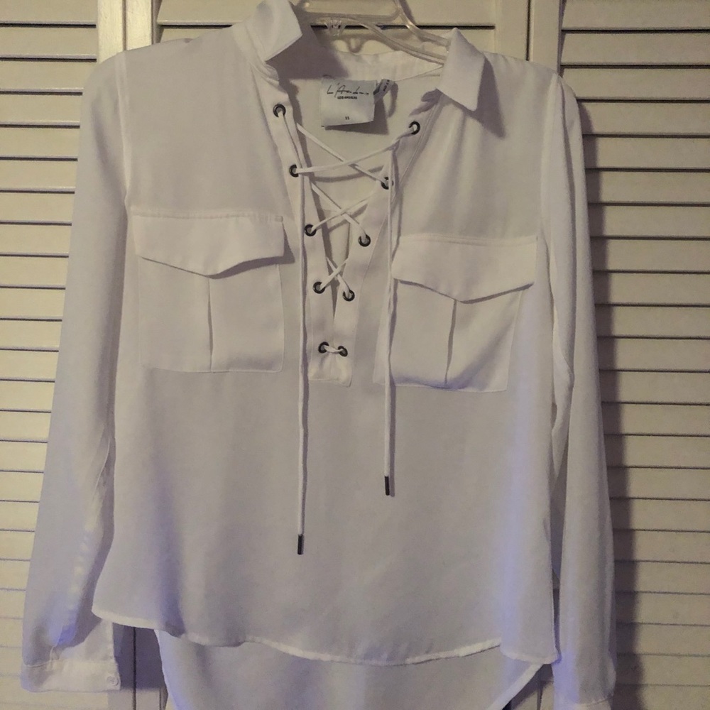 A LOVELY WHITE BLOUSE NEVER USED!!!